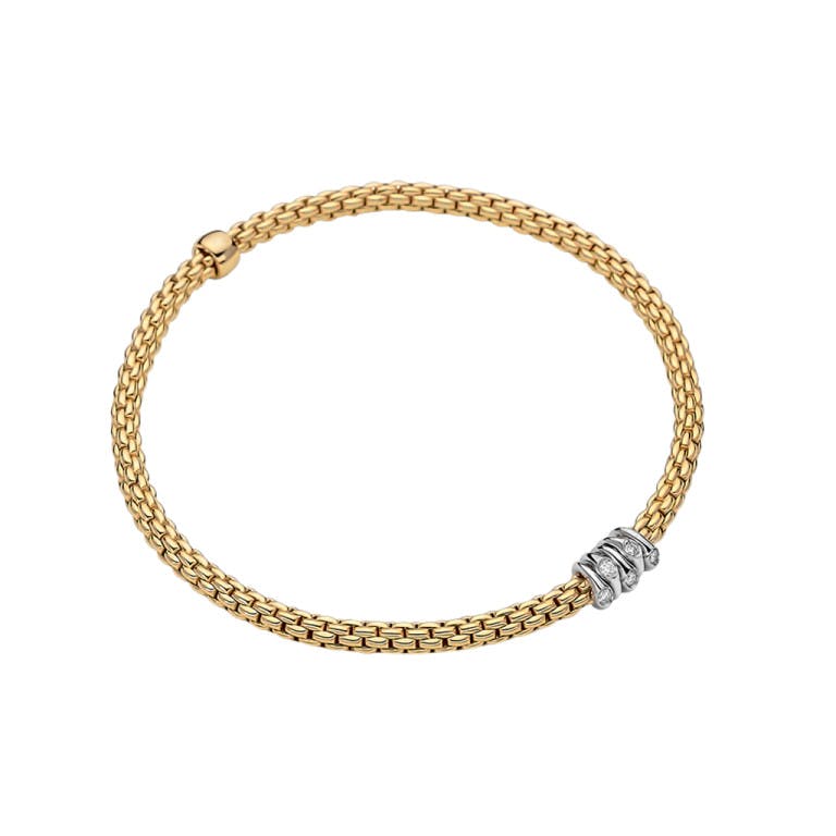 Fope Prima flexibele armband geel/wit goud met diamant