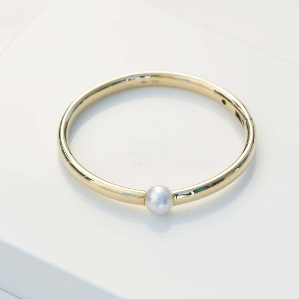Yana Nesper Open Mind armband geelgoud met parel - OM31 - #3 Yana Nesper Open Mind armband geelgoud met parel - OM31 - #3